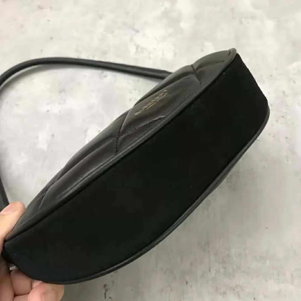 Burberry Quilted Lambskin Olympia Pouch for Women in Black Burberry Quilted Lambskin Olympia Pouch for Women in Black