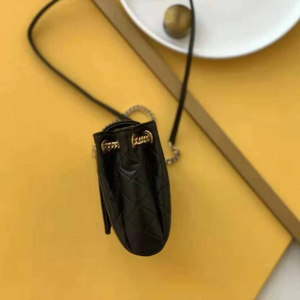 Saint Laurent YSL Mini Nolita in Lambskin for Women in Black Saint Laurent YSL Mini Nolita in Lambskin for Women in Black