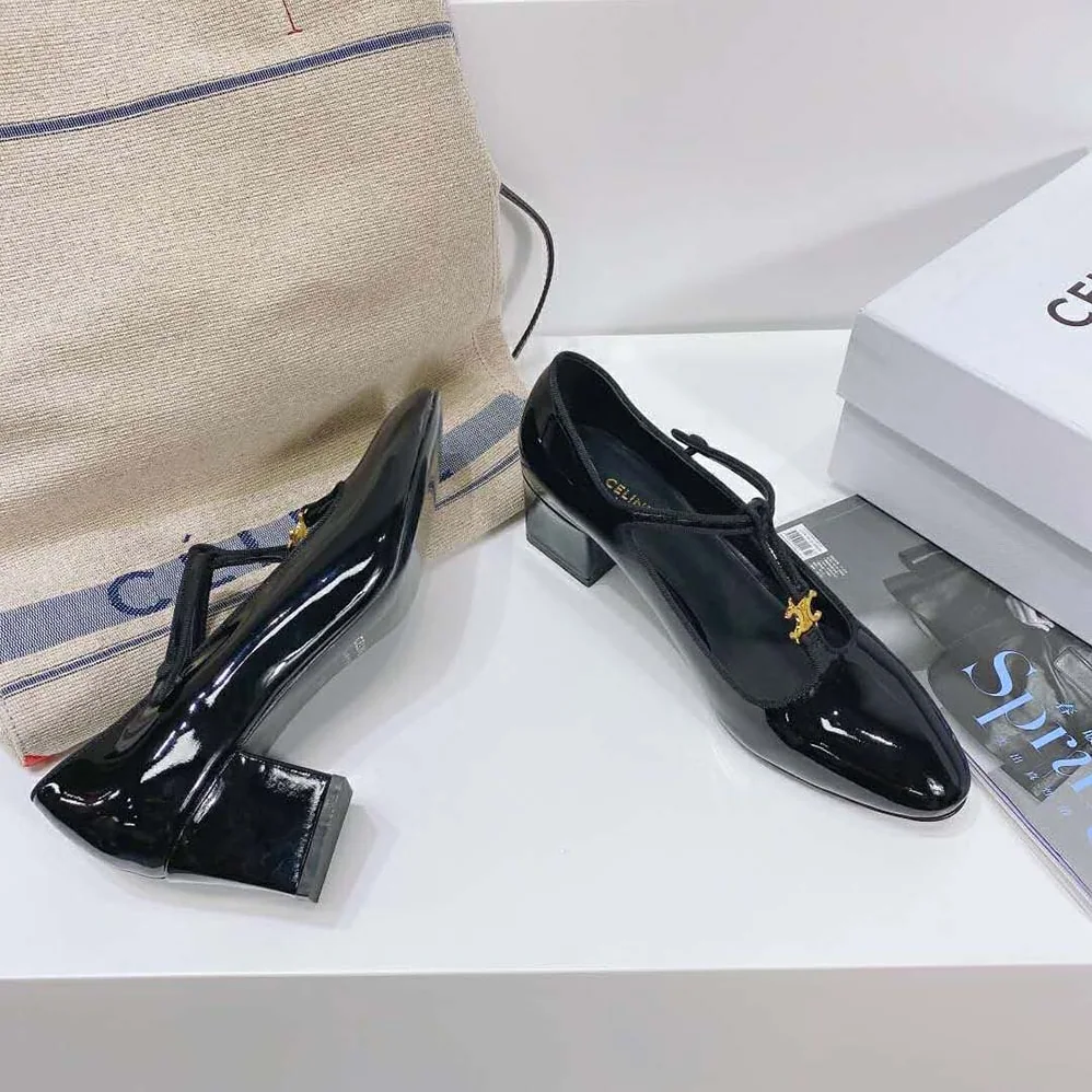 Celine Babies T-Bar Pump in Patent Calfskin and Grosgrain for Women in Black Celine Babies T-Bar Pump in Patent Calfskin and Grosgrain for Women in Black