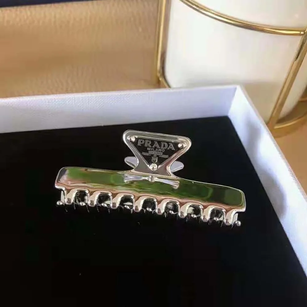 Prada Metal Hair Clip with Sophisticated and Versatile Allure for Women Prada Metal Hair Clip with Sophisticated and Versatile Allure for Women