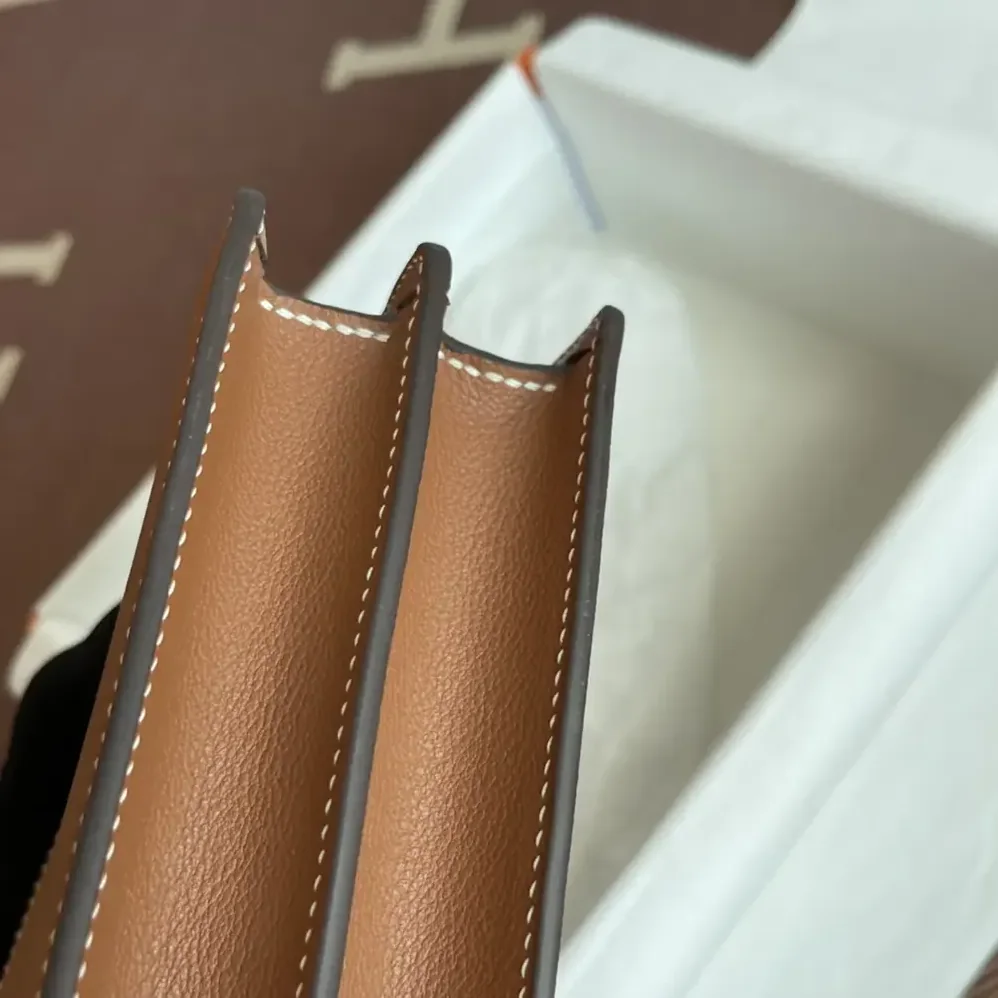 Hermes Roulis Mini Bag in Evercolor Calfskin for Women in Brown/Silver Hermes Roulis Mini Bag in Evercolor Calfskin for Women in Brown/Silver