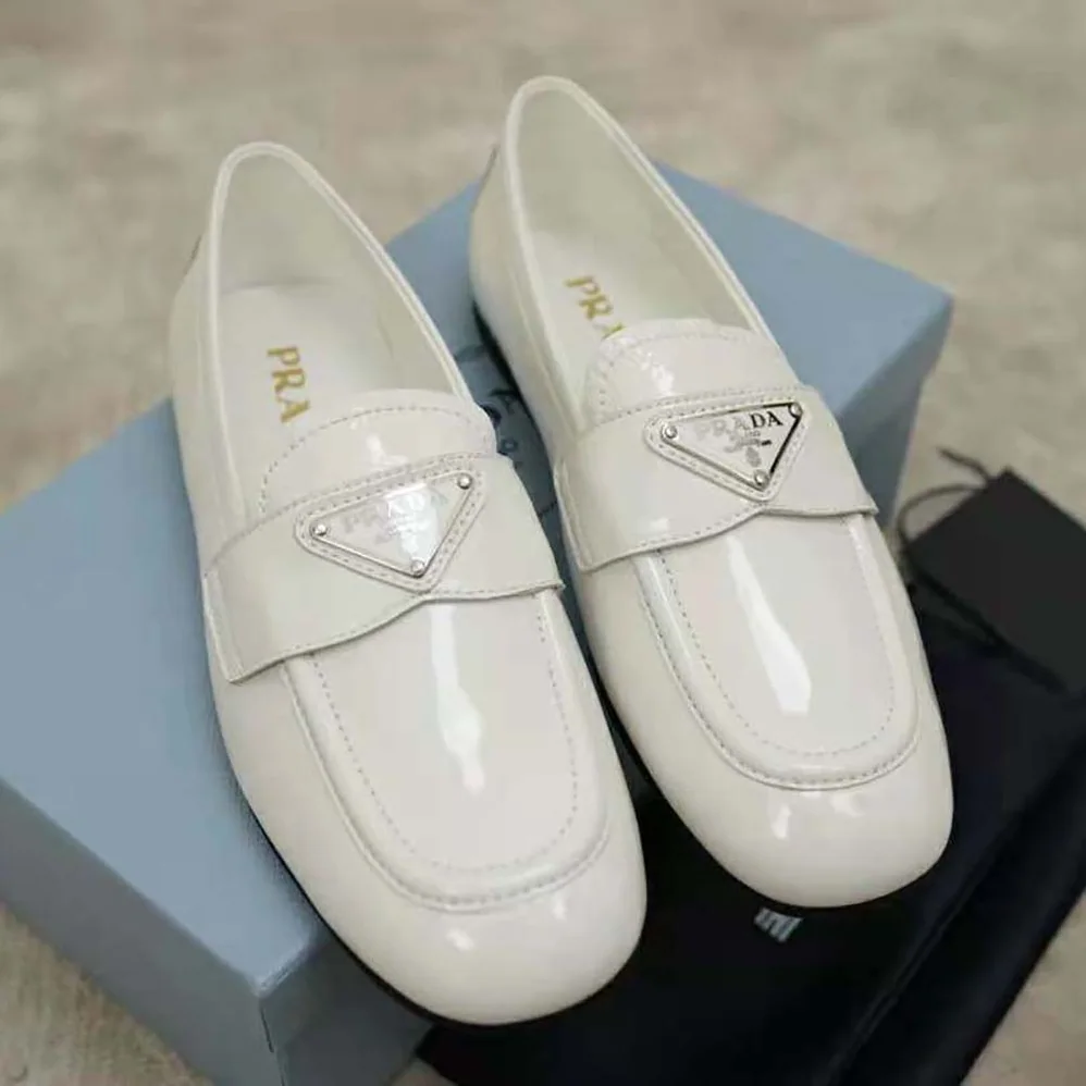 Prada Patent Leather Loafers in 5mm Heel for Women in White Prada Patent Leather Loafers in 5mm Heel for Women in White