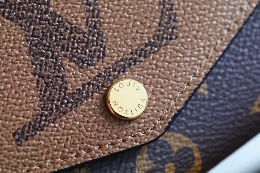 Louis Vuitton Sarah Wallet Monogram and Monogram Reverse Canvas Louis Vuitton Sarah Wallet Monogram and Monogram Reverse Canvas