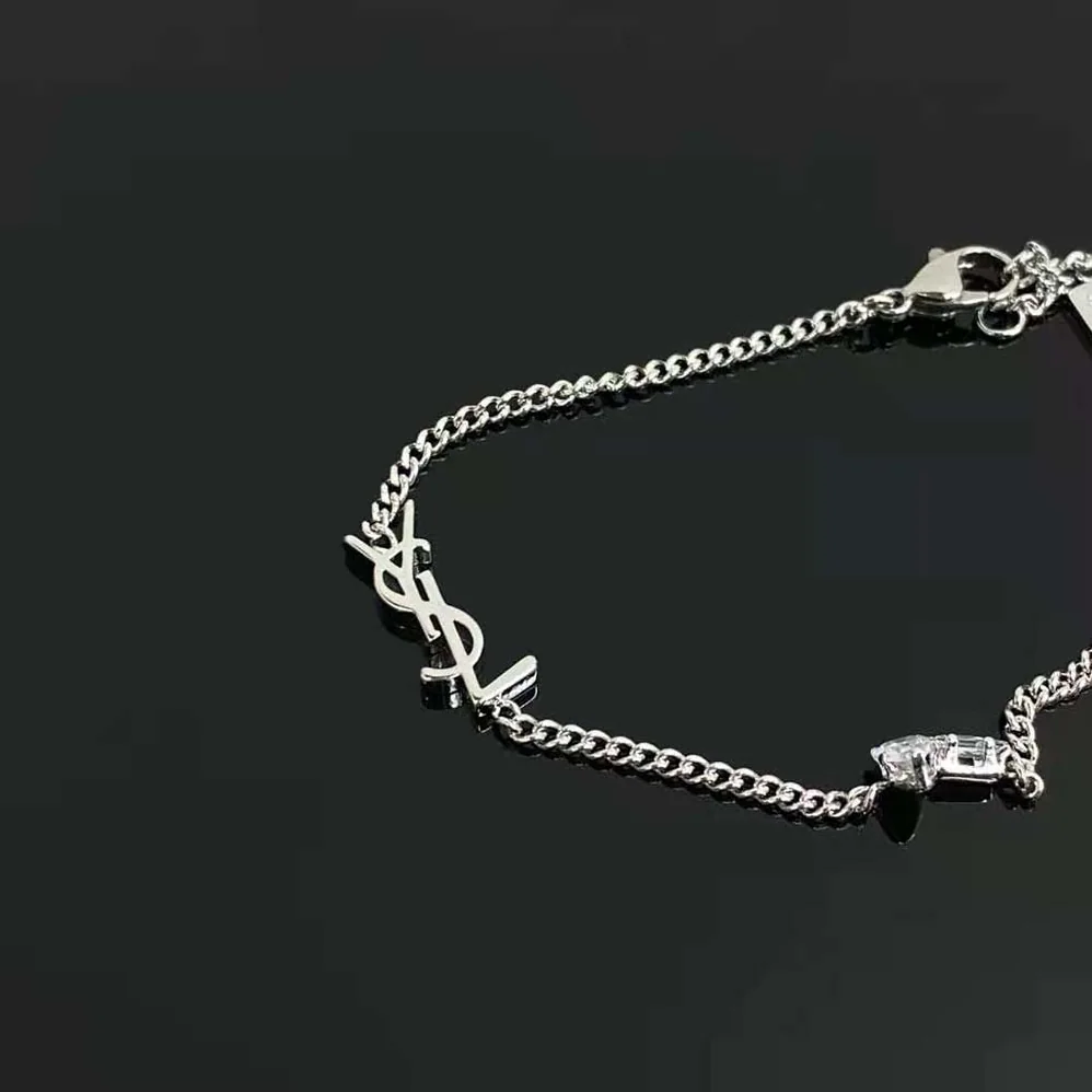 Saint Laurent YSL Opyum Charm Bracelet in Metal and Rhinestone for Women Saint Laurent YSL Opyum Charm Bracelet in Metal and Rhinestone for Women