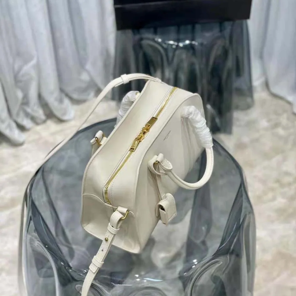 Saint Laurent YSL Lock Baby Duffle in Smooth Leather for Women in White Saint Laurent YSL Lock Baby Duffle in Smooth Leather for Women in White
