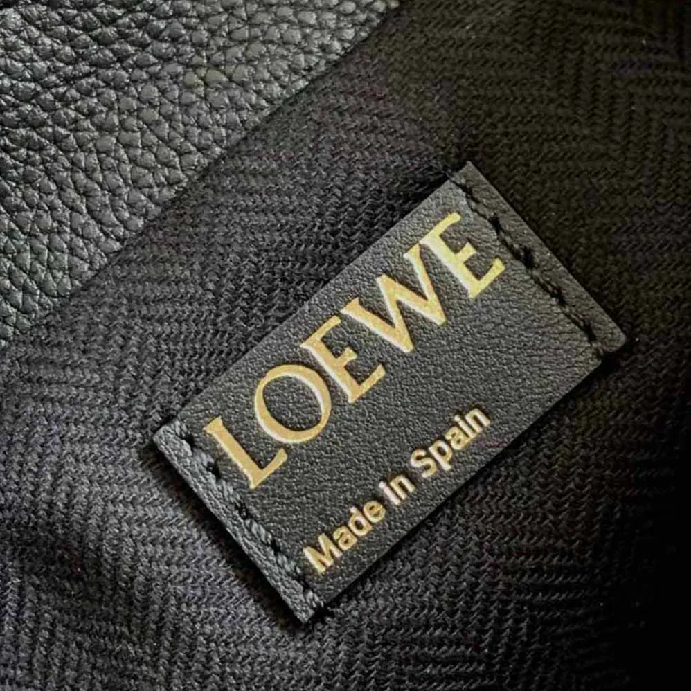 Loewe Mini Flamenco Clutch in Anagram Jacquard and Calfskin for Women in Black