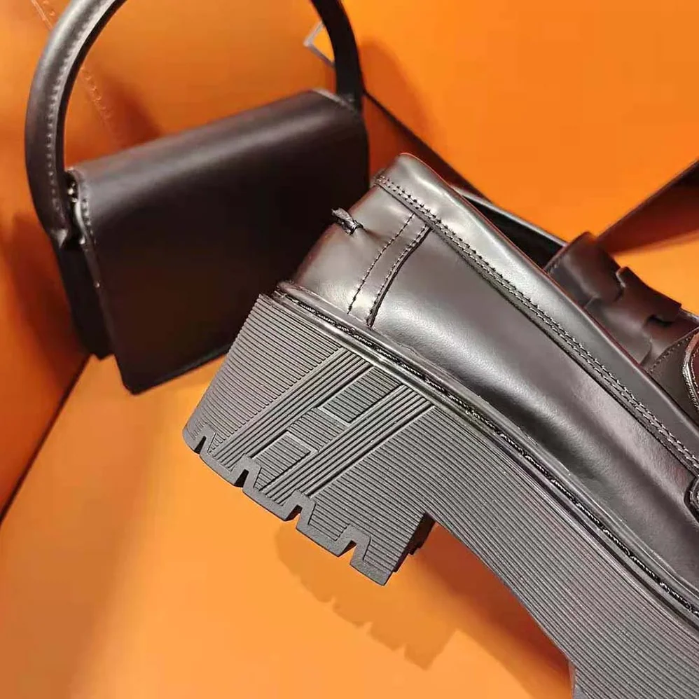 Hermes Hitch Loafer in Glazed Calfskin for Women in Black Hermes Hitch Loafer in Glazed Calfskin for Women in Black