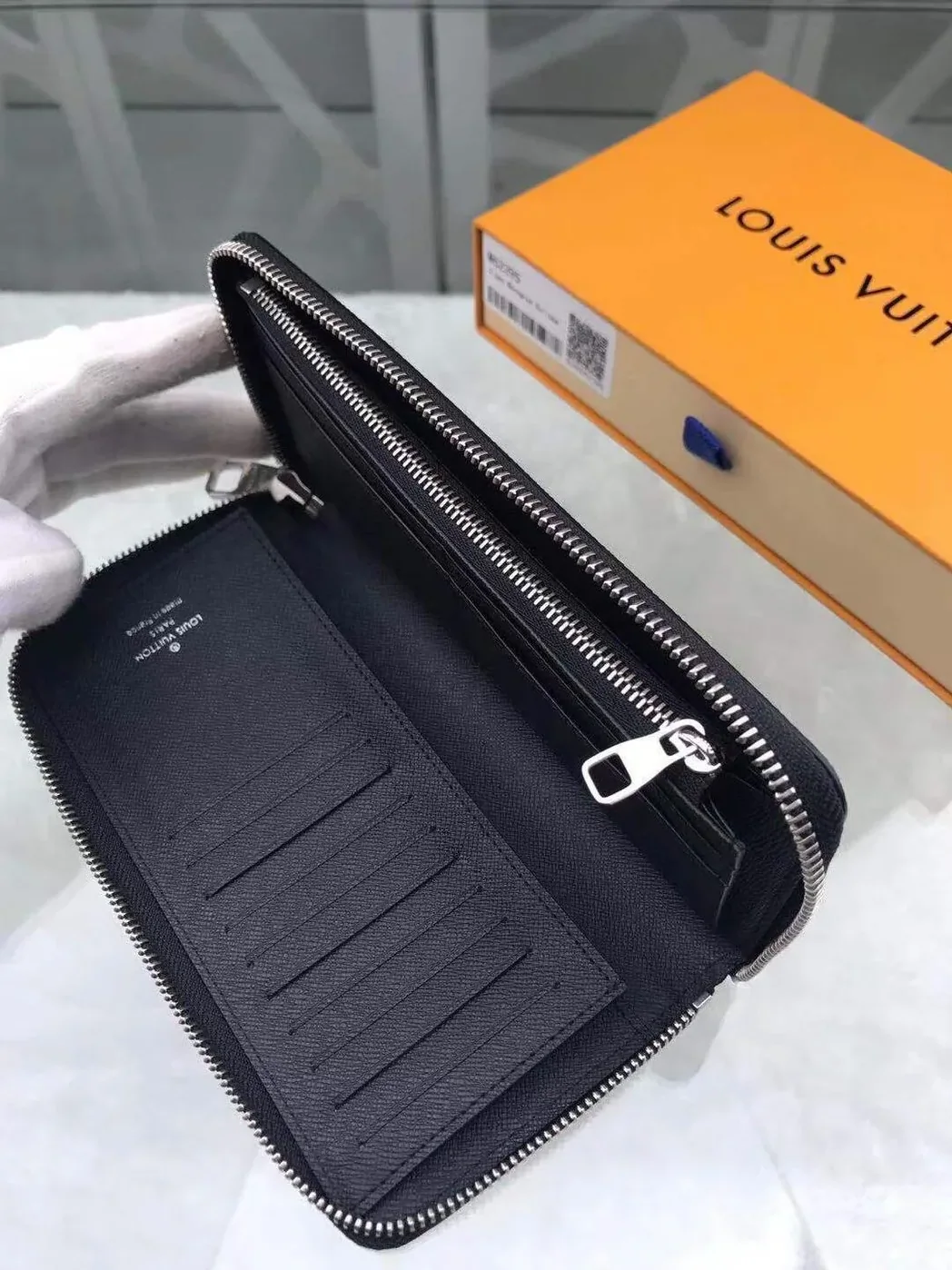 Louis Vuitton Zippy Wallet Vertical Monogram Eclipse Canvas