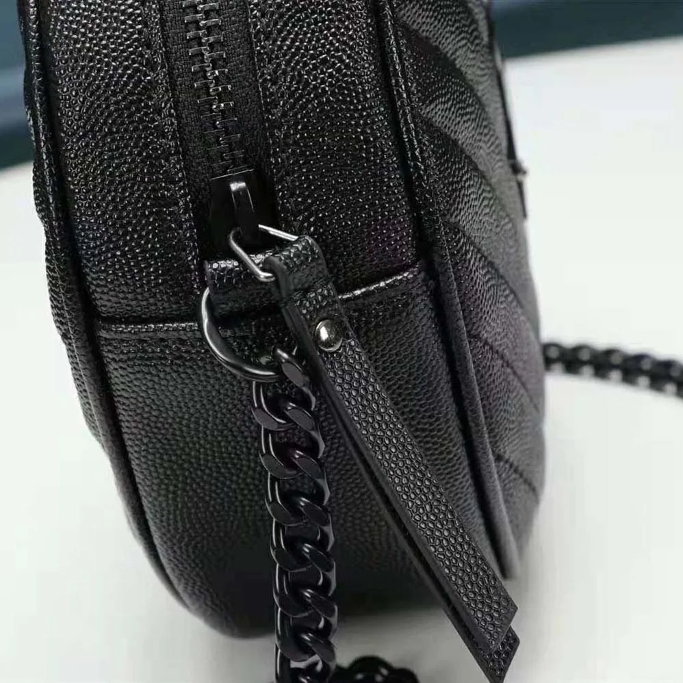 Saint Laurent YSL Vinyle Round Camera Bag in Chevron for Women in Quilted Smooth Leather