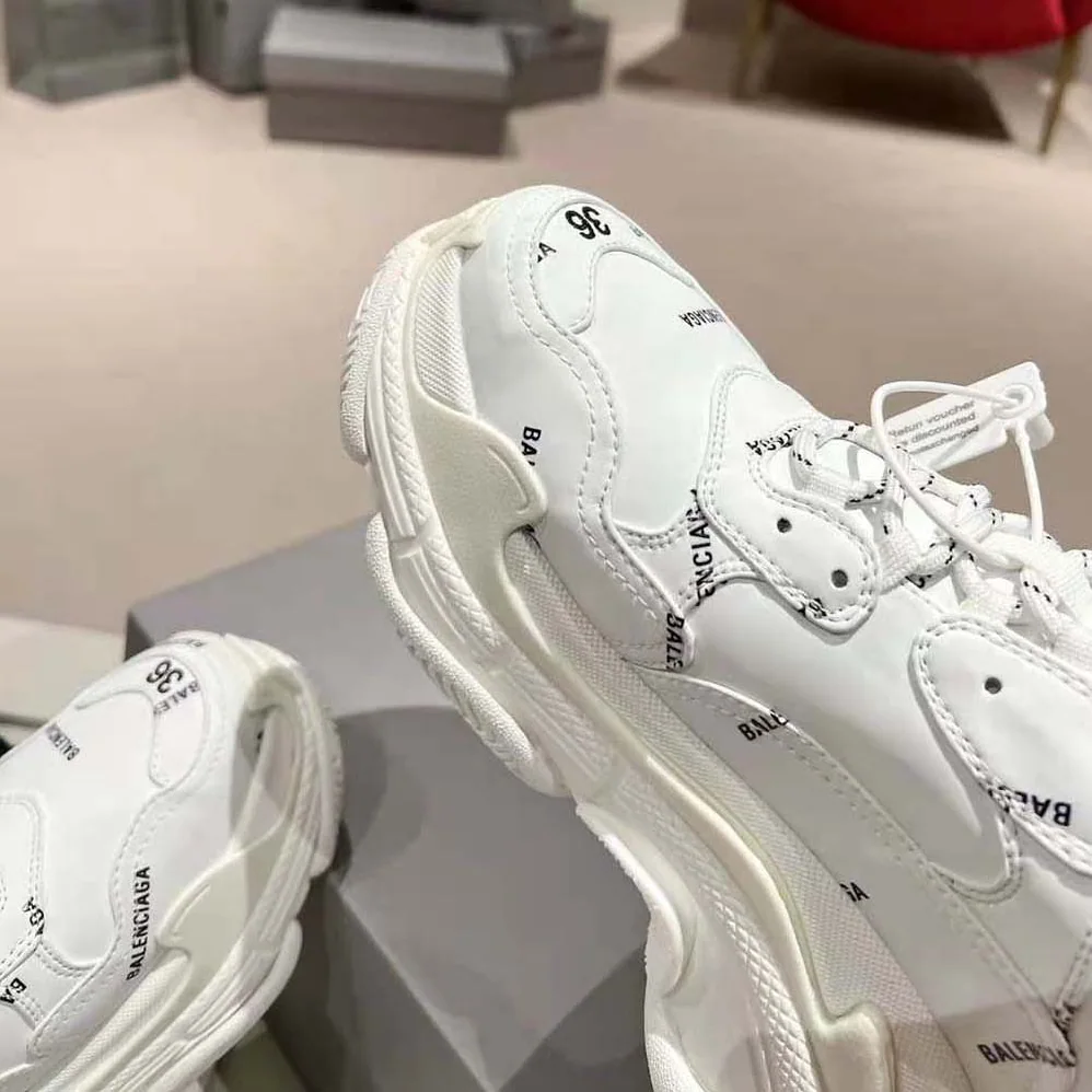 Balenciaga Triple S Sneaker Allover Logo in White and Black Technical Material for Unisex Balenciaga Triple S Sneaker Allover Logo in White and Black Technical Material for Unisex