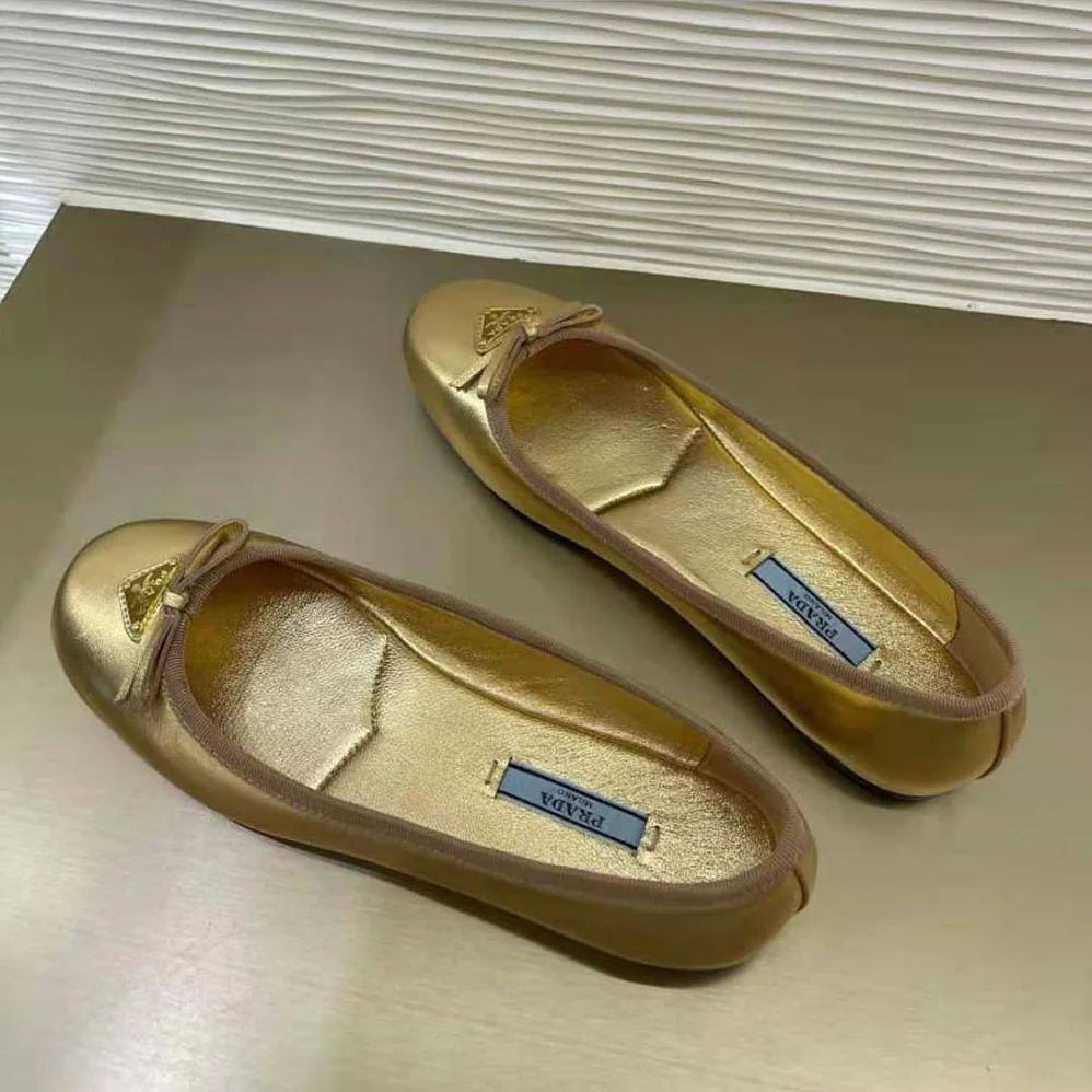 Prada Nappa Leather Ballerinas for Women in Gold Prada Nappa Leather Ballerinas for Women in Gold