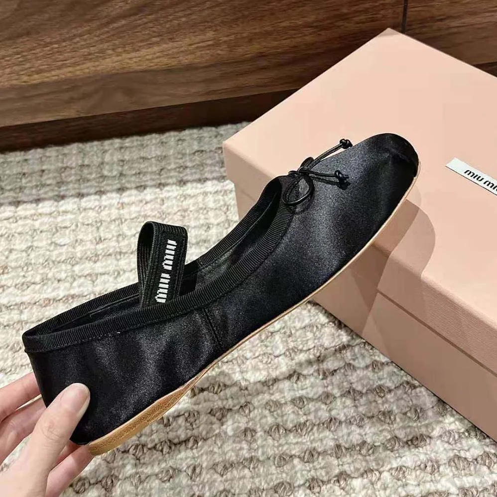 Miu Miu Satin Ballerinas with Knit Logo Label for Women in Black Miu Miu Satin Ballerinas with Knit Logo Label for Women in Black