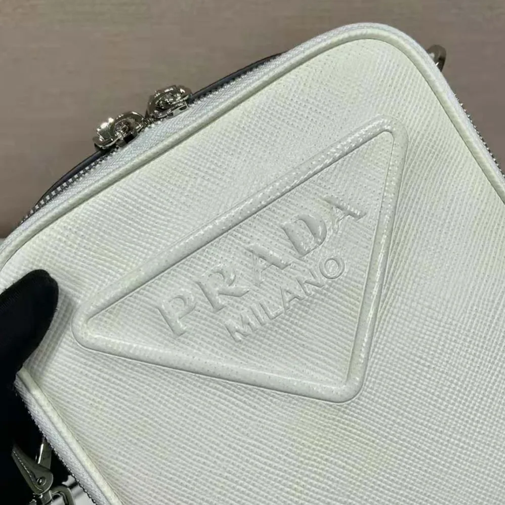 Prada Saffiano Leather Shoulder Bag with Sleek for Men in White Prada Saffiano Leather Shoulder Bag with Sleek for Men in White