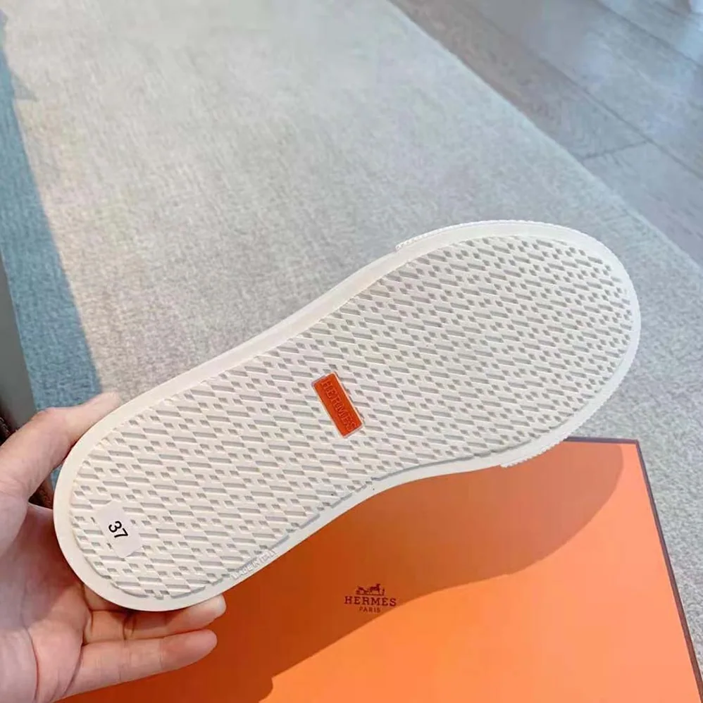 Hermes Get Sneaker in SH Canvas and Calfskin with Signature “Hermès Paris” Stencil for Unisex in Silver Hermes Get Sneaker in SH Canvas and Calfskin with Signature “Hermès Paris” Stencil for Unisex in Silver