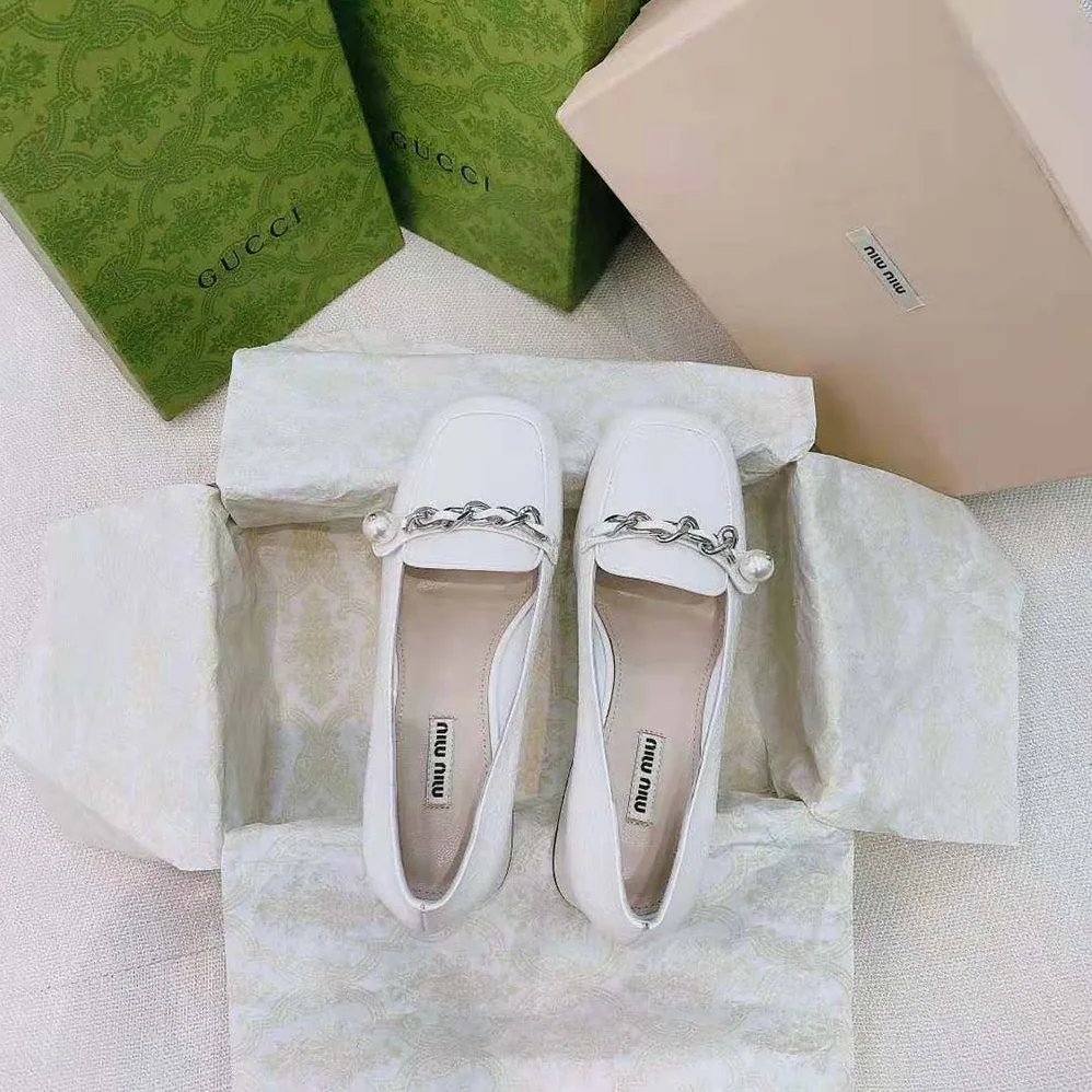 Miu Miu Patent Leather Loafers in 35mm Heel for Women in White Miu Miu Patent Leather Loafers in 35mm Heel for Women in White