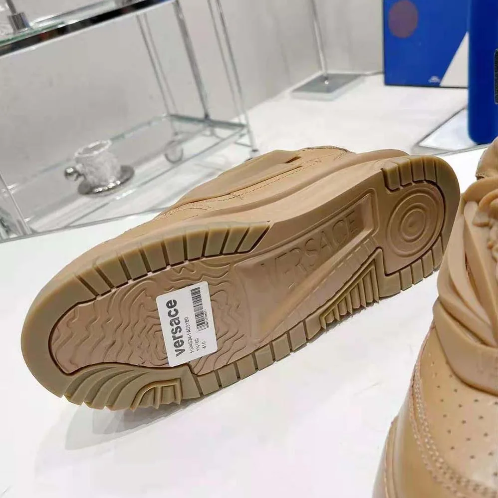 Versace Odissea Sneakers are Set on Rubber Soles with Perforated Toe Caps for Unisex in Brown Versace Odissea Sneakers are Set on Rubber Soles with Perforated Toe Caps for Unisex in Brown