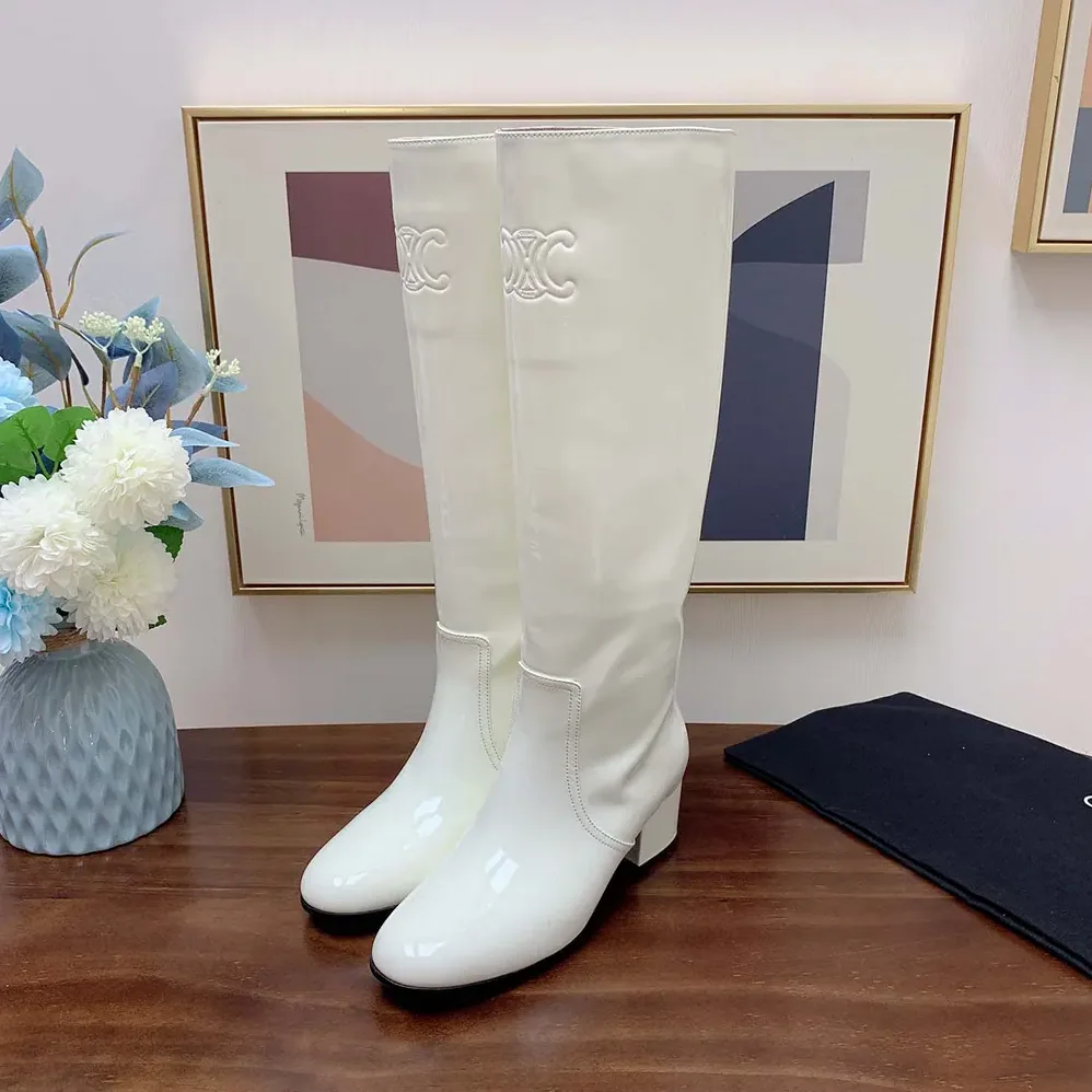 Celine Les Bottes Celine Triomphe High Boot in Patent Calfskin for Women in White
