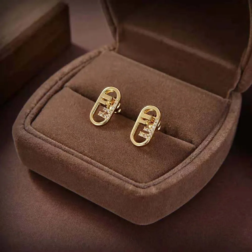 Fendi O'lock Earrings Gold for Women in Colored Earrings