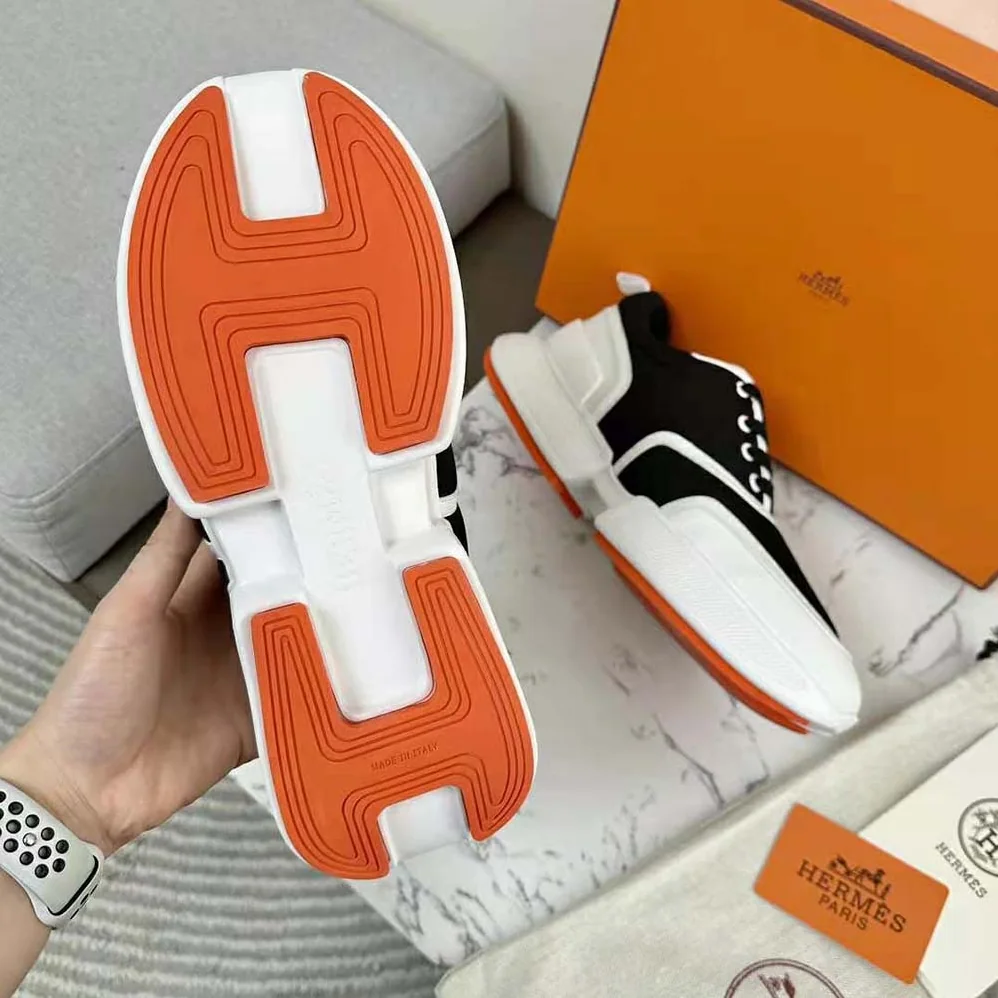 Hermes Giga Sneaker in Mesh Pique and Calfskin for Women in Black Hermes Giga Sneaker in Mesh Pique and Calfskin for Women in Black