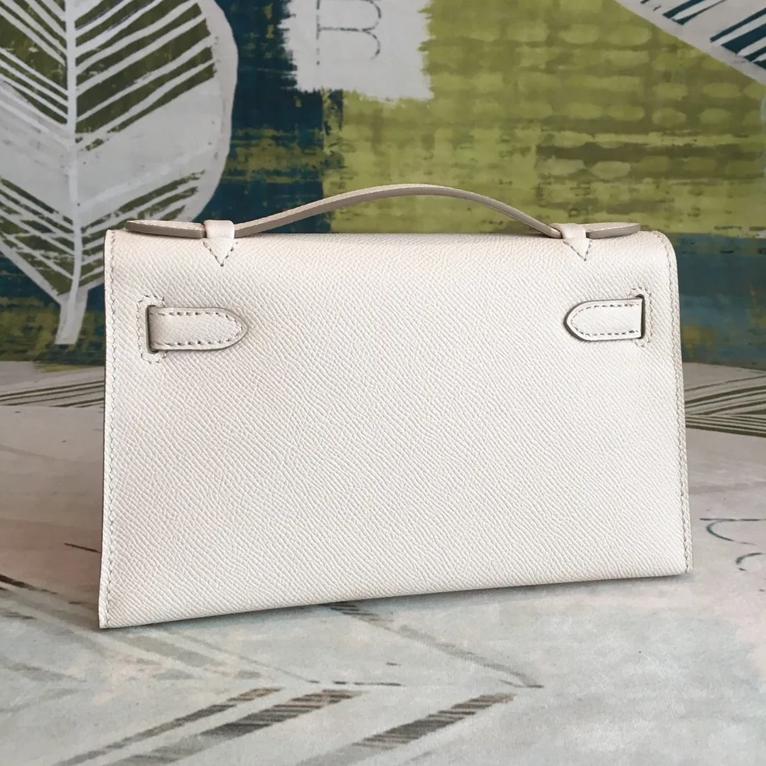 Hermes Kelly Pochettee White Gold Toned Hardware /