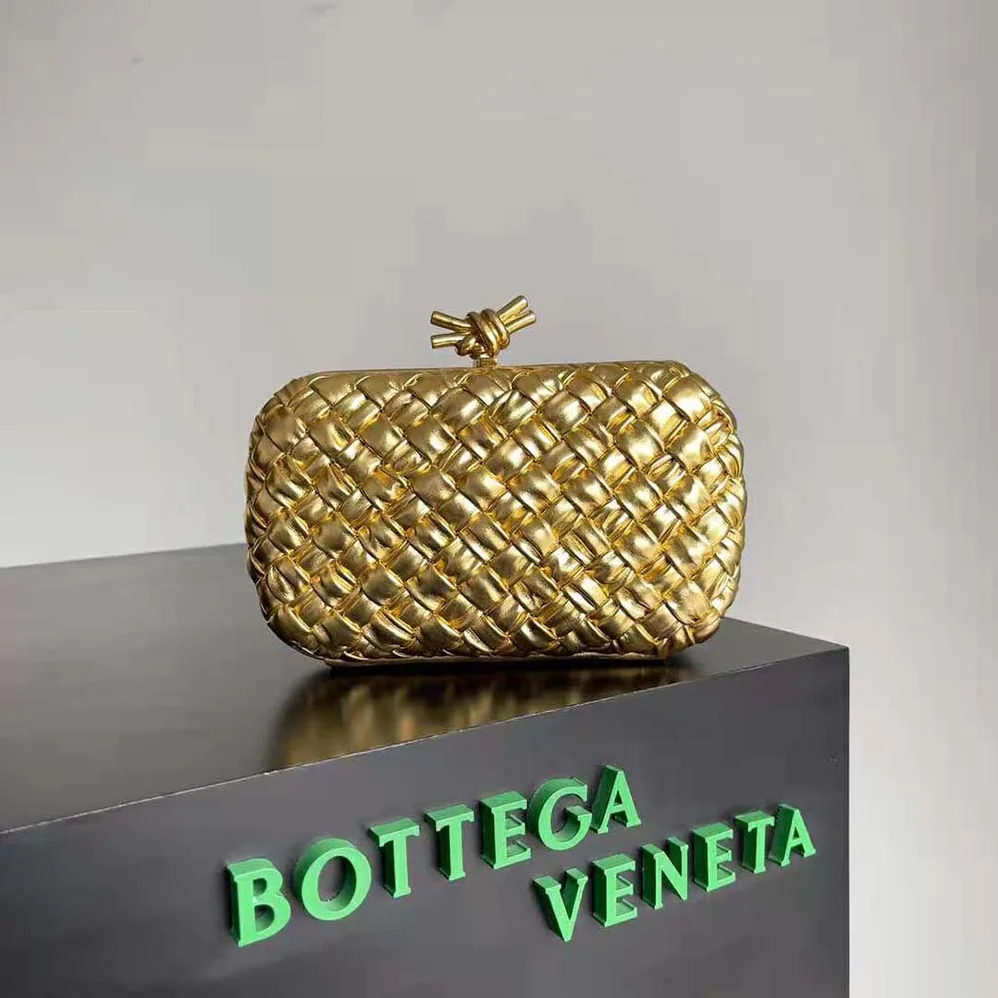 Bottega Veneta Knot Pressed Intreccio Laminated Leather Minaudiere for Women in Gold