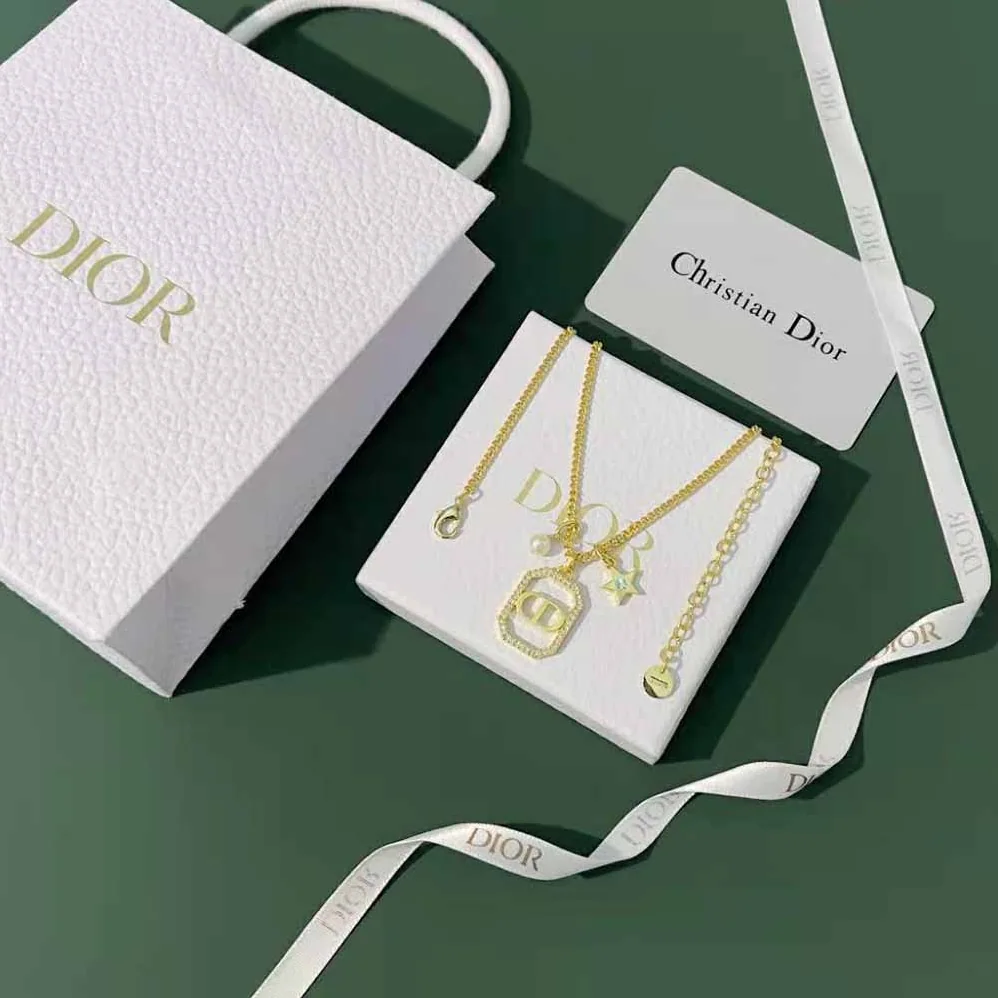 Dior Petit CD Necklace Gold-Finish Metal with a White Resin Pearl and White Crystals for Women Dior Petit CD Necklace Gold-Finish Metal with a White Resin Pearl and White Crystals for Women