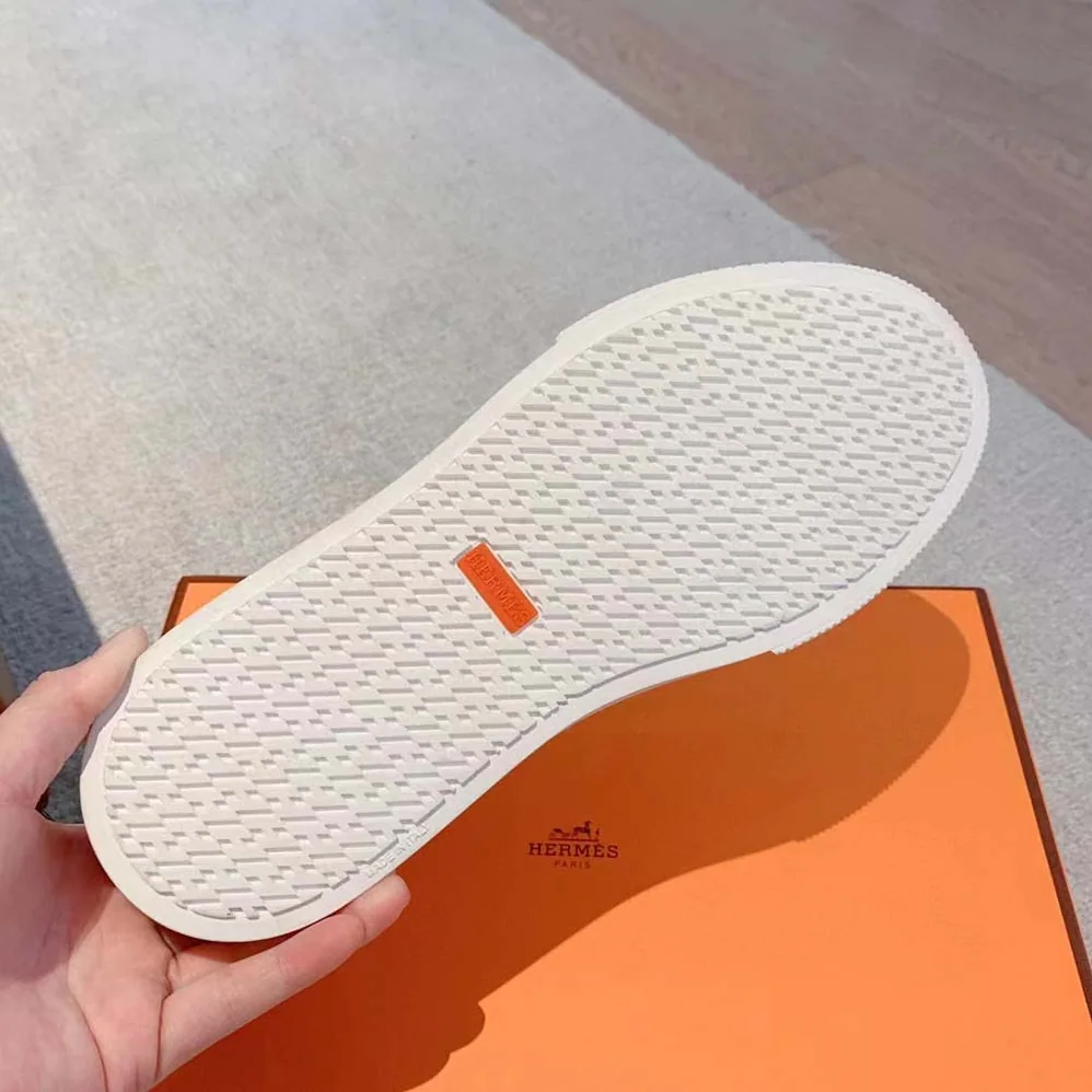 Hermes Get Sneaker in Calfskin with Signature “Hermès Paris” Stencil for Unisex in White Hermes Get Sneaker in Calfskin with Signature “Hermès Paris” Stencil for Unisex in White