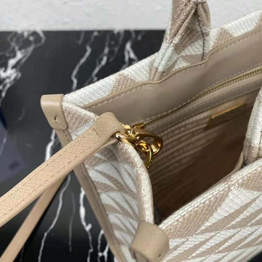 Prada Small Prada Symbole Embroidered Fabric Handbag for Women in Beige