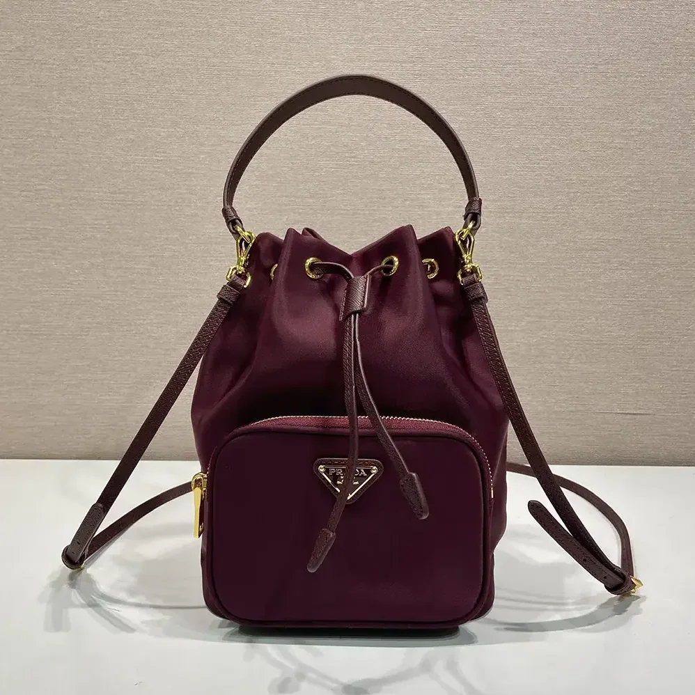 Prada Duet Re-Nylon Bucket Bag for Women in Maroon Prada Duet Re-Nylon Bucket Bag for Women in Maroon