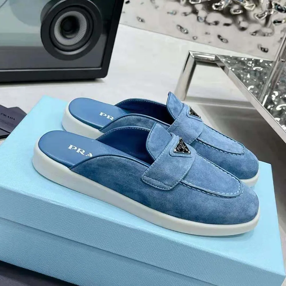 Prada Suede Sabots with the Enameled Metal Triangle Logo for Men