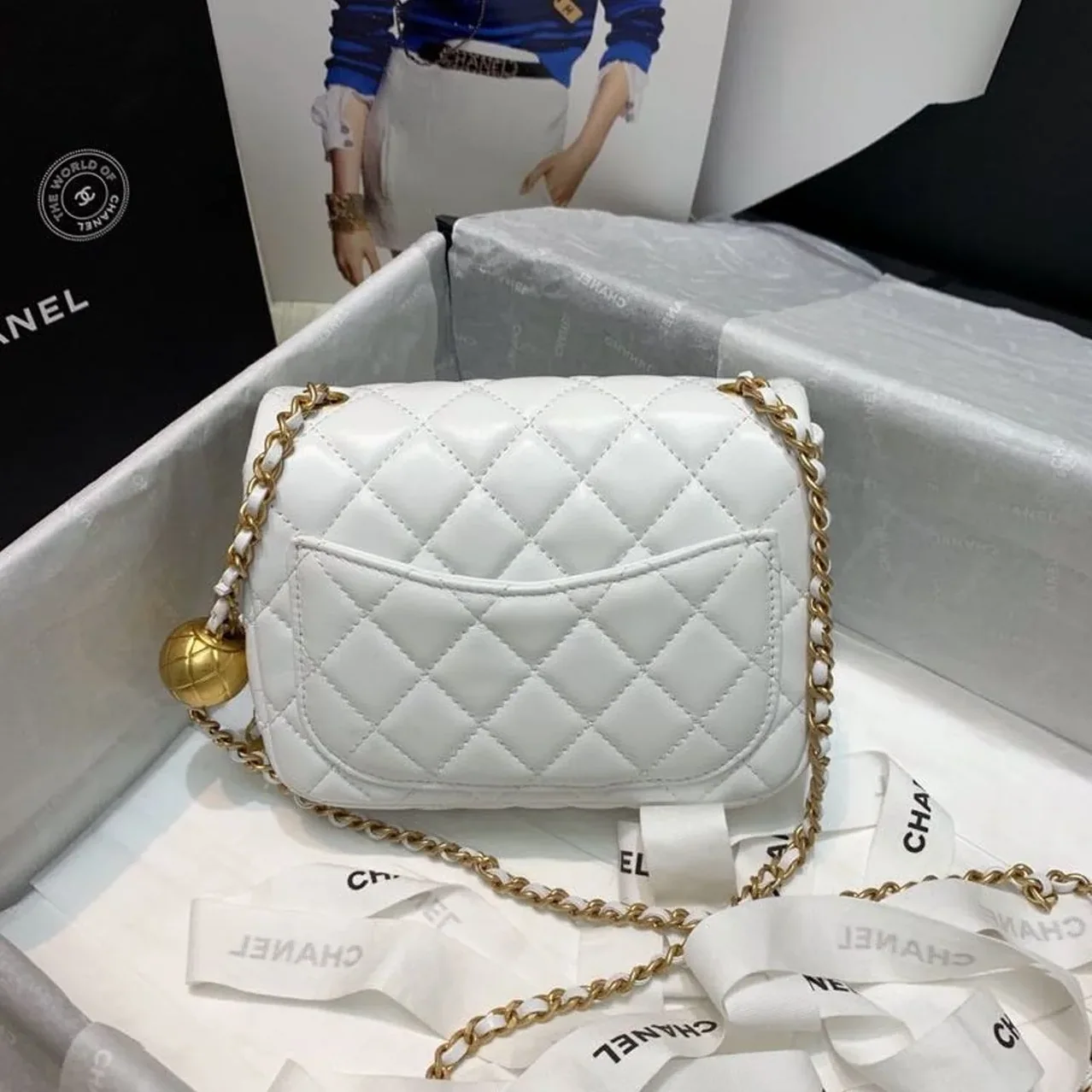 Chanel Flap Bag With CC Ball On Strap Mini Crossbody in White Gold Hardware Chanel Flap Bag With CC Ball On Strap Mini Crossbody in White Gold Hardware