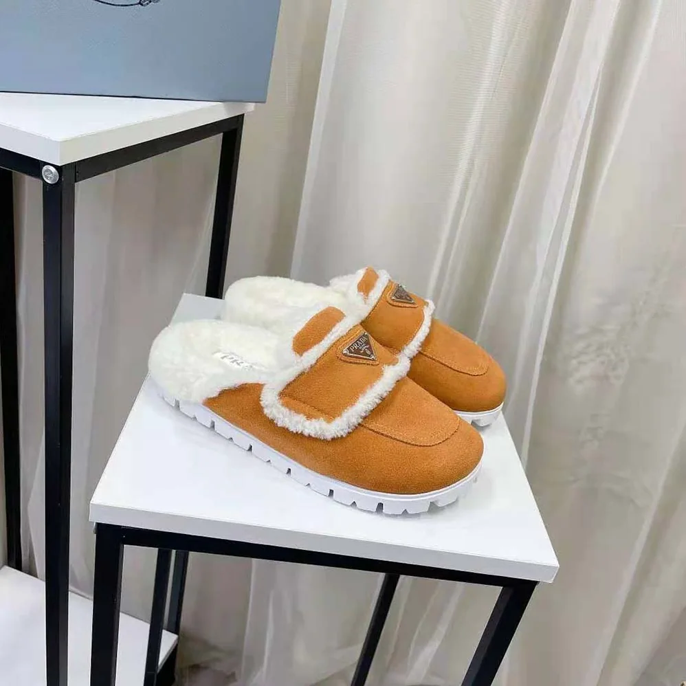 Prada Shearling Slippers Enameled Metal Triangle Logo for Women in Yellow Prada Shearling Slippers Enameled Metal Triangle Logo for Women in Yellow