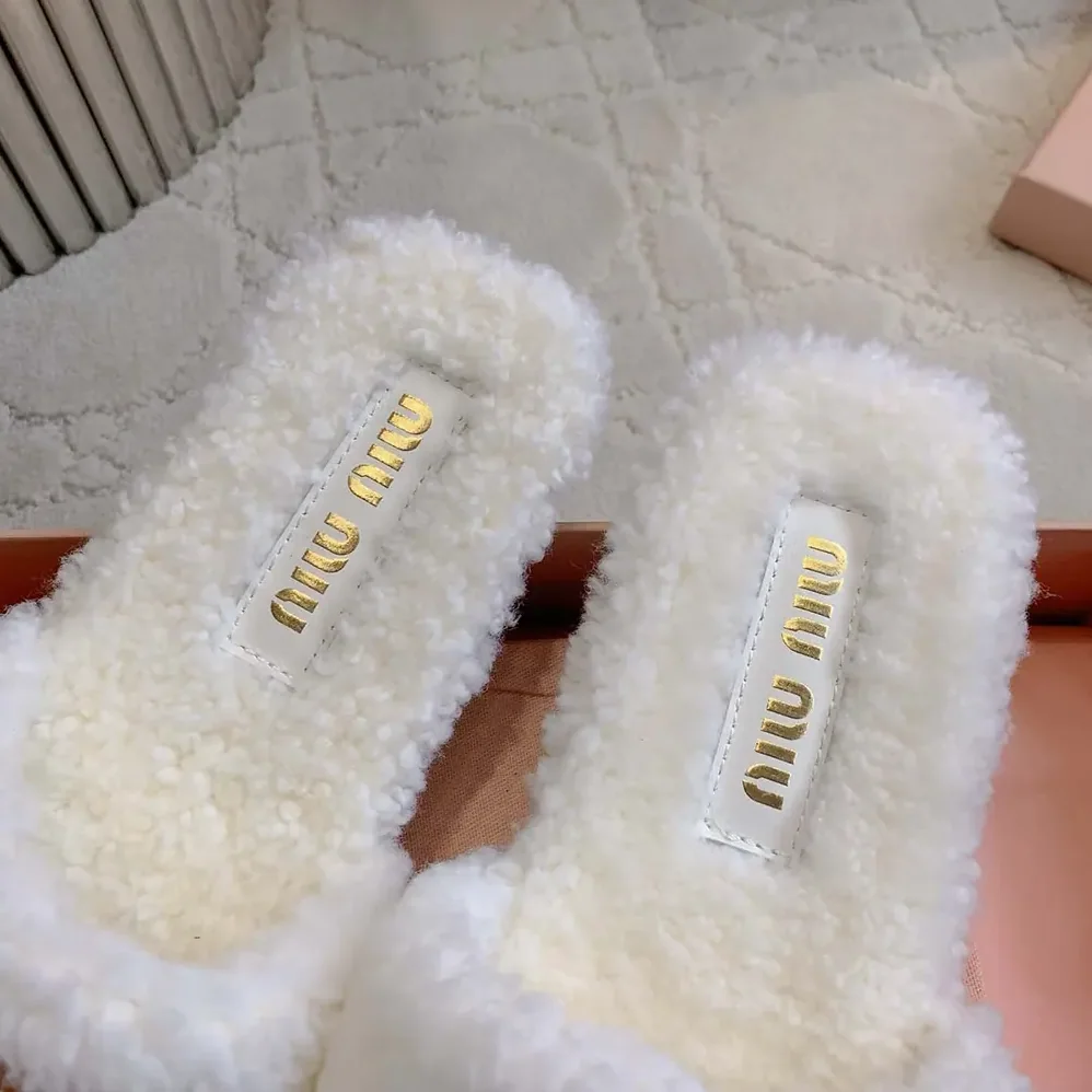 Miu Miu Shearling Slides with Leather Logo for Women