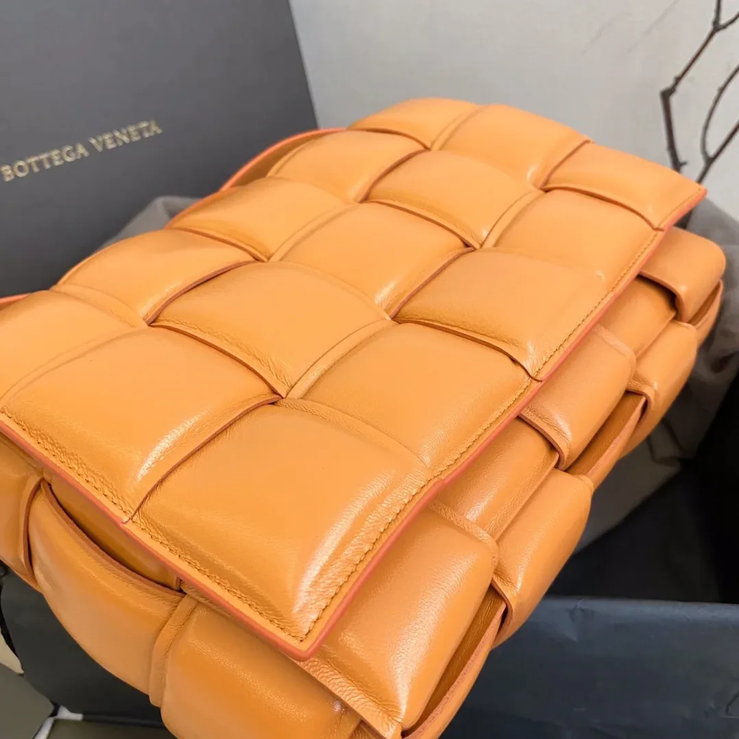 Bottega Veneta Padded Cassette Bag in In Orange