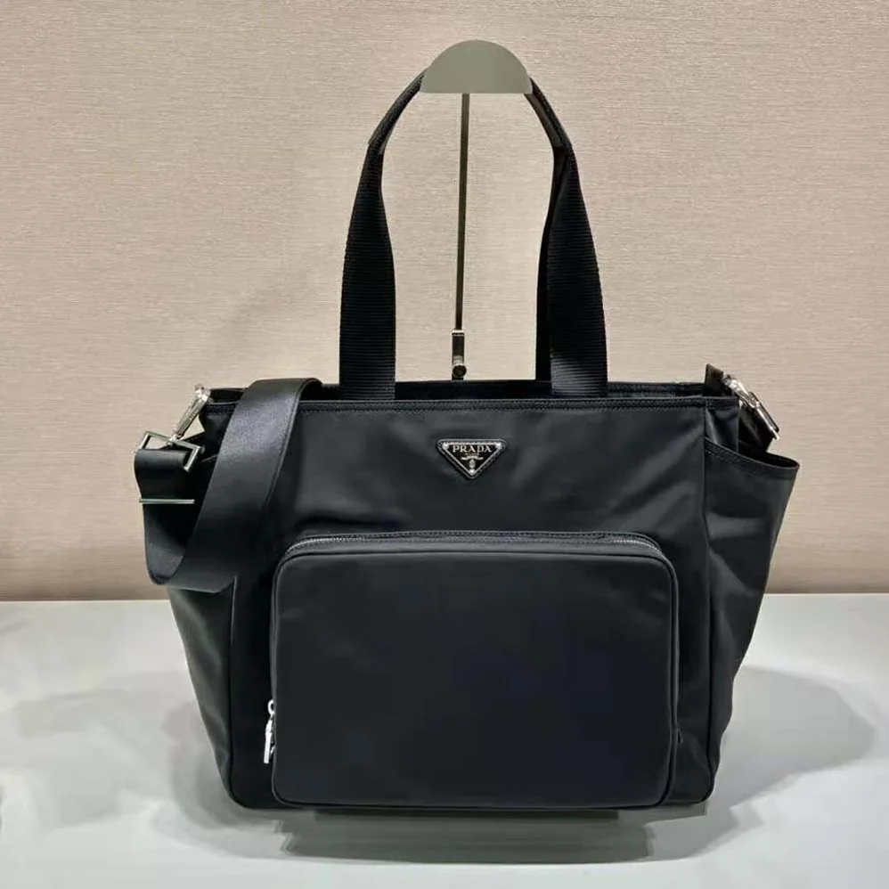 Prada Re-Nylon Baby Bag with Re-Nylon logo-Print lining for Women in Black