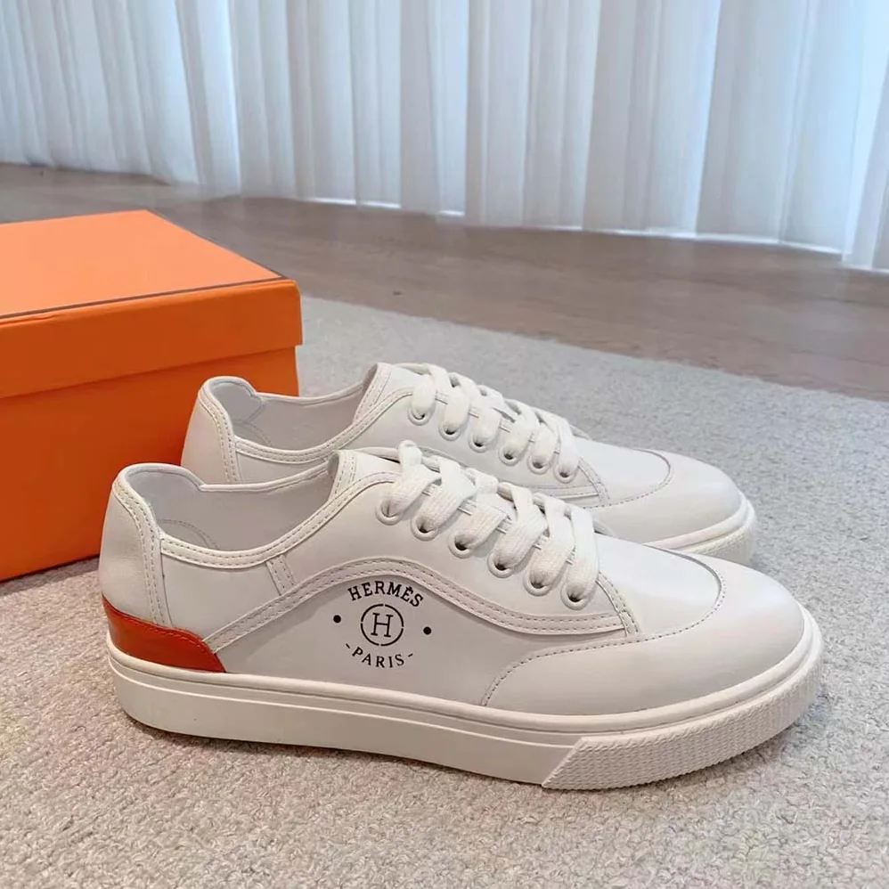 Hermes Get Sneaker in Calfskin with Signature “Hermès Paris” Stencil for Unisex in White Hermes Get Sneaker in Calfskin with Signature “Hermès Paris” Stencil for Unisex in White