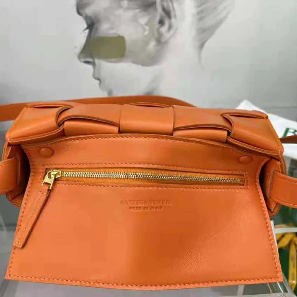 Bottega Veneta Cassette Intreccio Leather Cross-Body Bag for Women in Orange Bottega Veneta Cassette Intreccio Leather Cross-Body Bag for Women in Orange