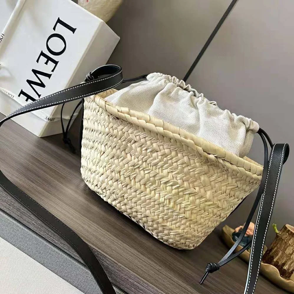Loewe Drawstring Bucket Bag in Palm Leaf and Calfskin for Women in Black