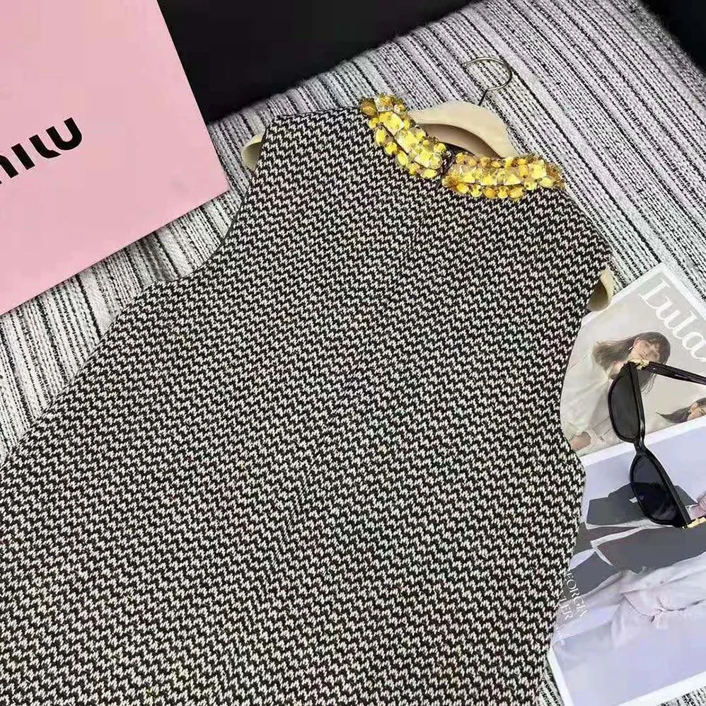 Miu Miu Embroidered Bouclé Mini for Women in dress with Embroidered Logo Miu Miu Embroidered Bouclé Mini for Women in dress with Embroidered Logo
