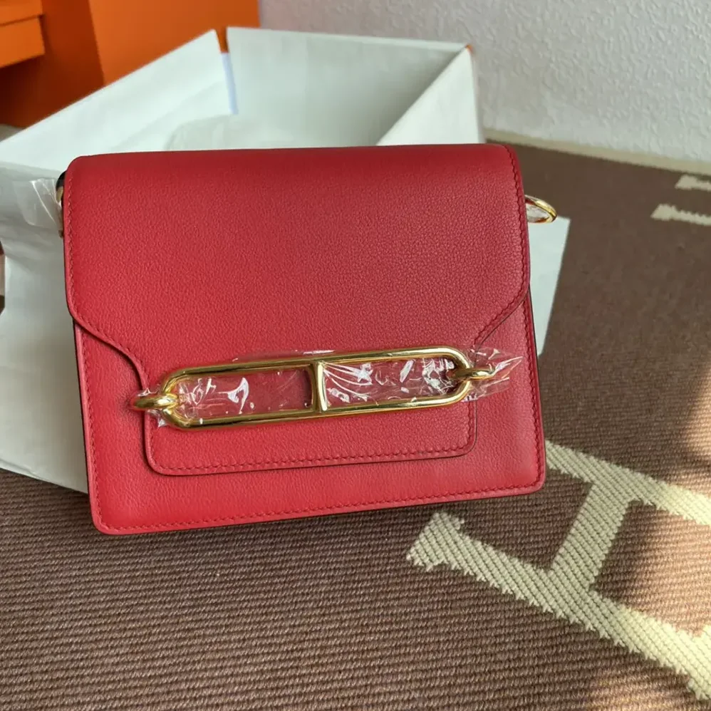 Hermes Roulis Mini Bag in Evercolor Calfskin for Women in Red/Gold