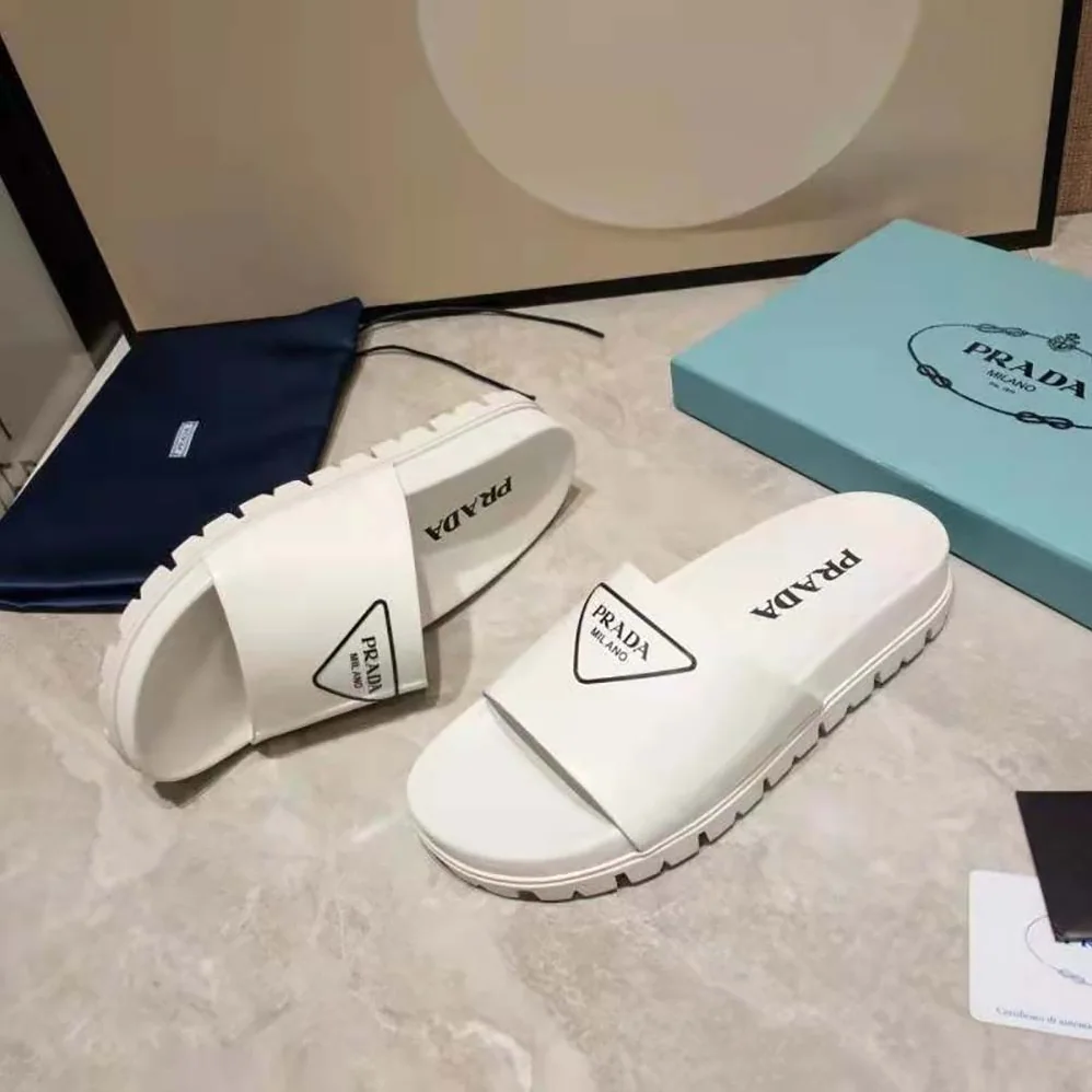 Prada Leather Slides in 20mm Heel for Women in White Prada Leather Slides in 20mm Heel for Women in White