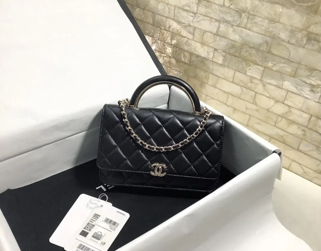 Chanel Hand-Held Oblique Cross Bag Black
