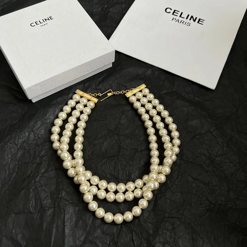 Celine Les Perles Celine Necklace in Resin Pearls Brass with Gold Finish and Steel for Women Celine Les Perles Celine Necklace in Resin Pearls Brass with Gold Finish and Steel for Women