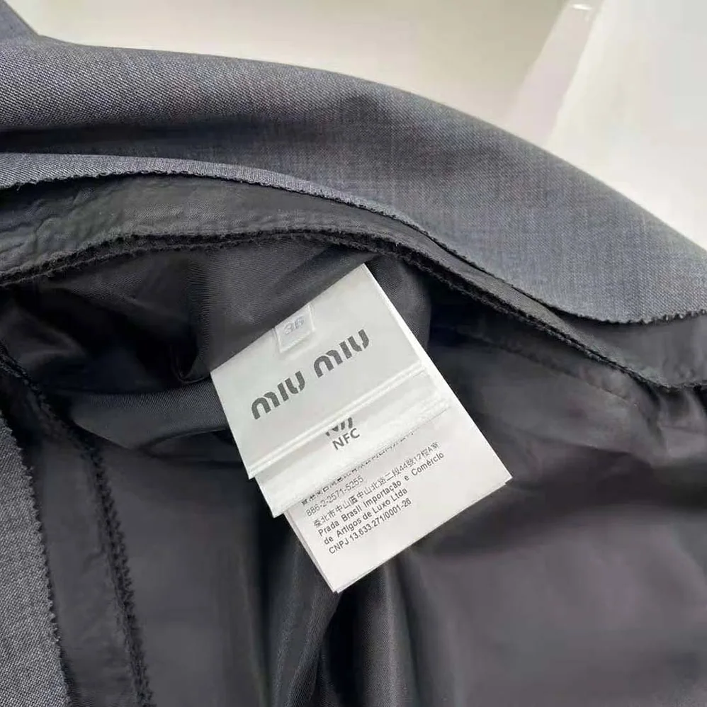 Miu Miu Grisaille Mini-Dress with Embroidered Logo for Women in Black Miu Miu Grisaille Mini-Dress with Embroidered Logo for Women in Black