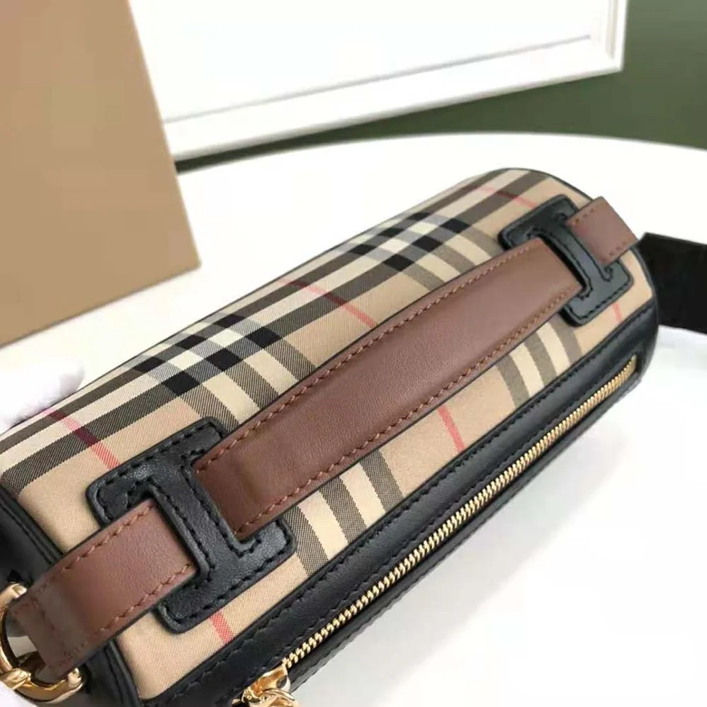 Burberry The Icon Stripe E-canvas and Leather Barrel Bag for Women in Brown Burberry The Icon Stripe E-canvas and Leather Barrel Bag for Women in Brown