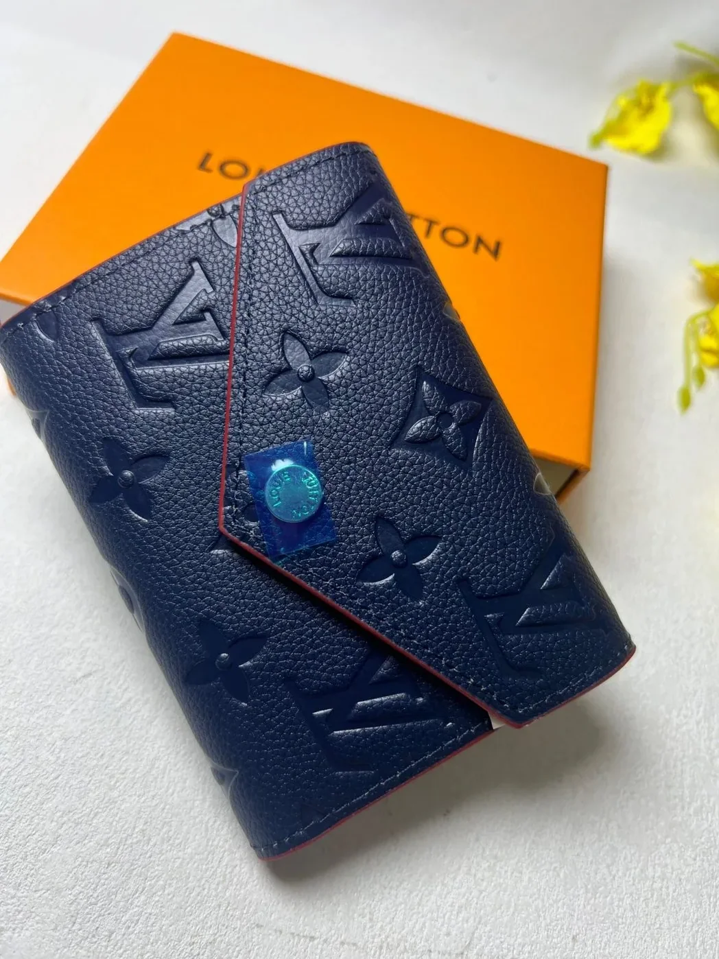Louis Vuitton Victorine Wallet Monogram Empreinte Navy Blue in Red