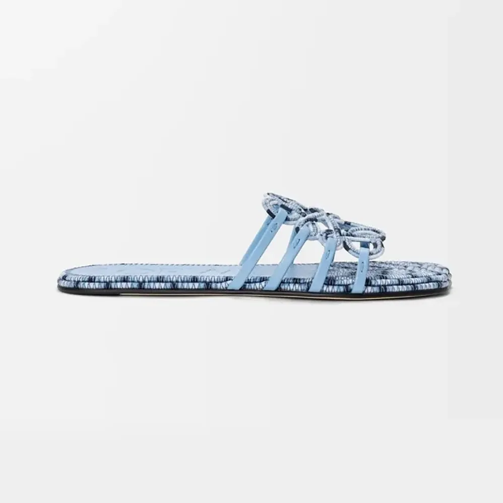 Loewe Petal Anagram Slide in Embroidered Canvas for Women in Baby Blue Loewe Petal Anagram Slide in Embroidered Canvas for Women in Baby Blue