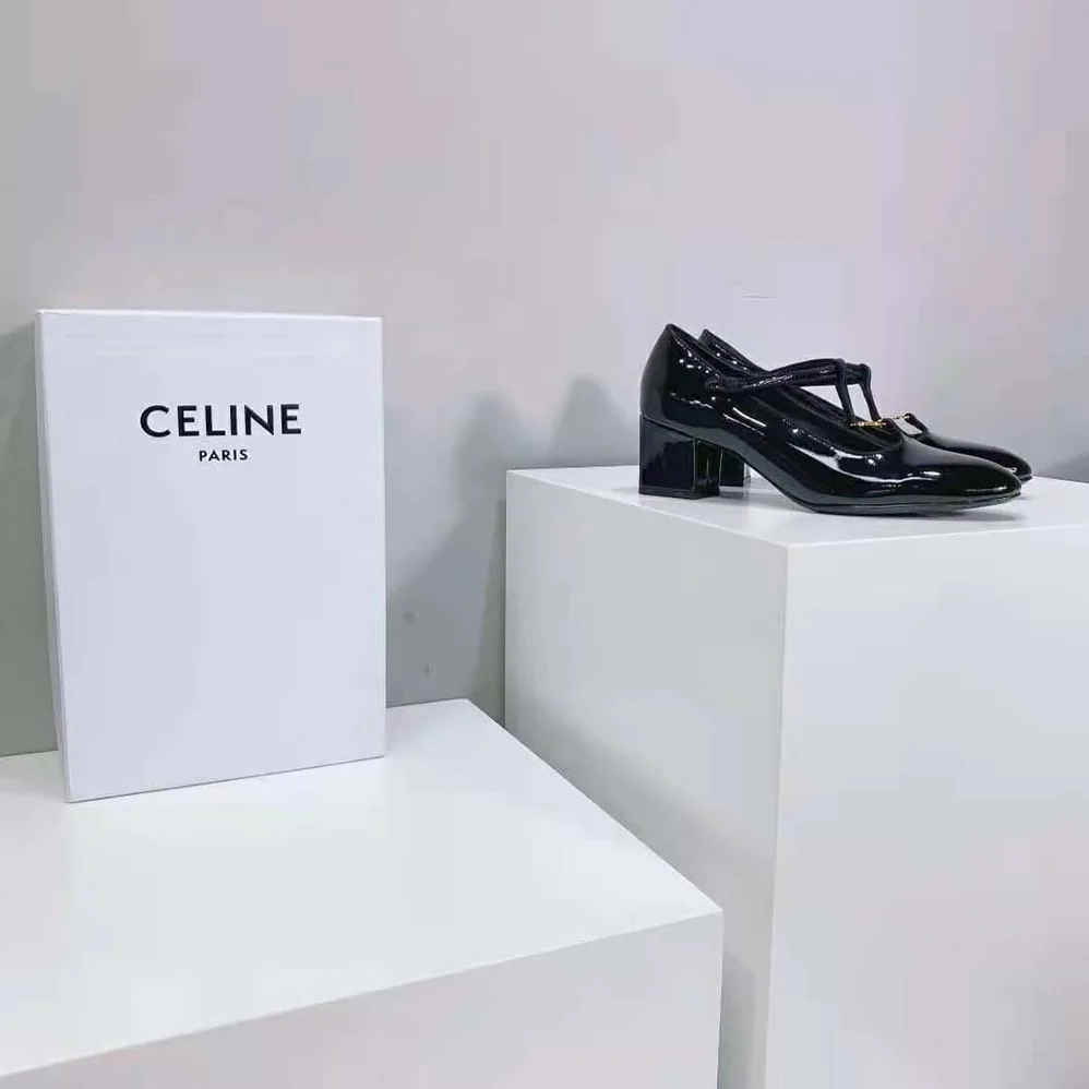 Celine Babies T-Bar Pump in Patent Calfskin and Grosgrain for Women in Black Celine Babies T-Bar Pump in Patent Calfskin and Grosgrain for Women in Black