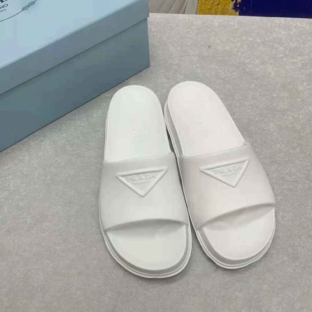Prada Rubber Slides In 20 mm Heel Height for Women in White Prada Rubber Slides In 20 mm Heel Height for Women in White
