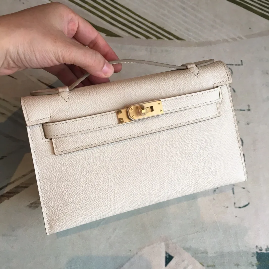 Hermes Kelly Pochettee White Gold Toned Hardware /